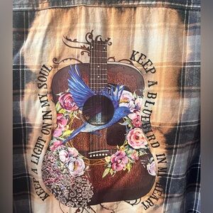 Weatherproof Vintage plaid shirt with print on back.  Men’s shirt size XL